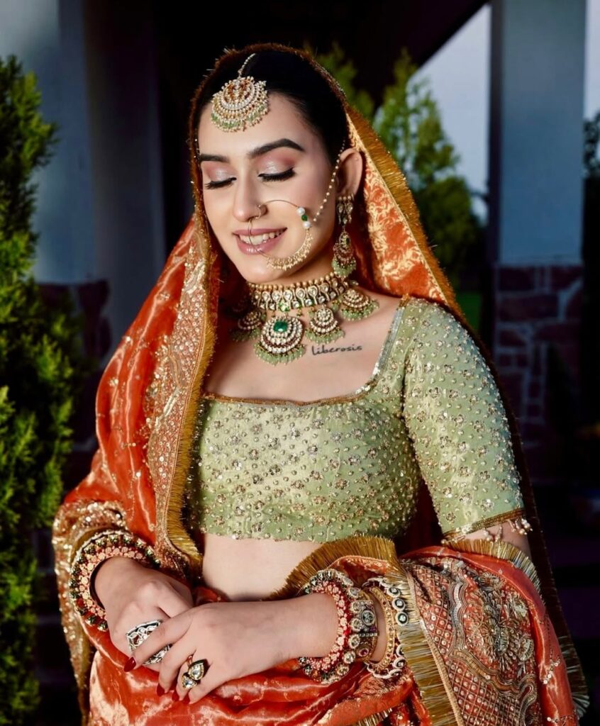 orange and green lehnga